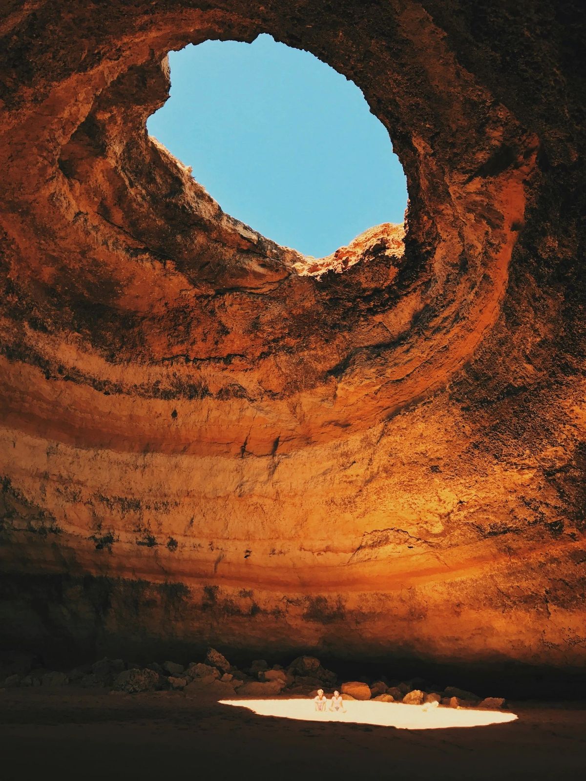The Benagil sea cave, its opening framing a patch of sky