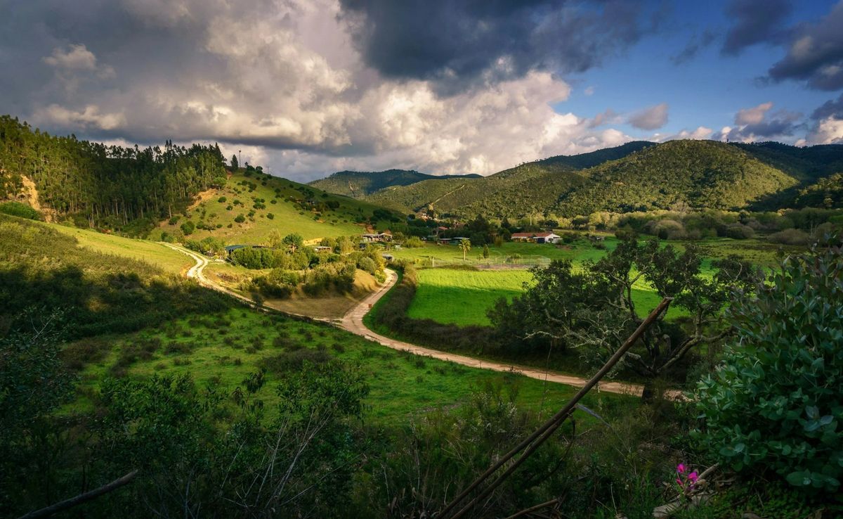 Green valleys rolling towards the hills of the Algarve