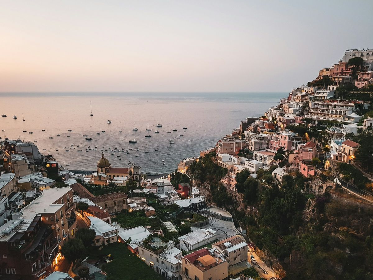 Sunrise over the bay of Positano and its pastel houses