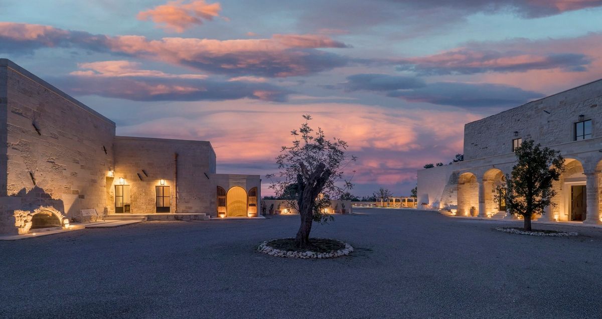 A masseria courtyard at dusk in Salento